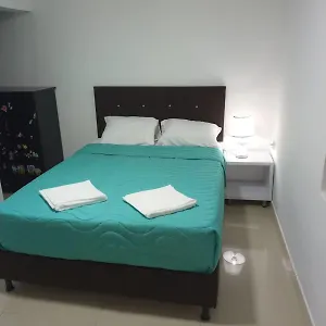 Habitación en casa particular En Apartamento Central, Cerca De Sitios Turisticos Jardin Botanico Y Metro Estacion Universidad, Medellín